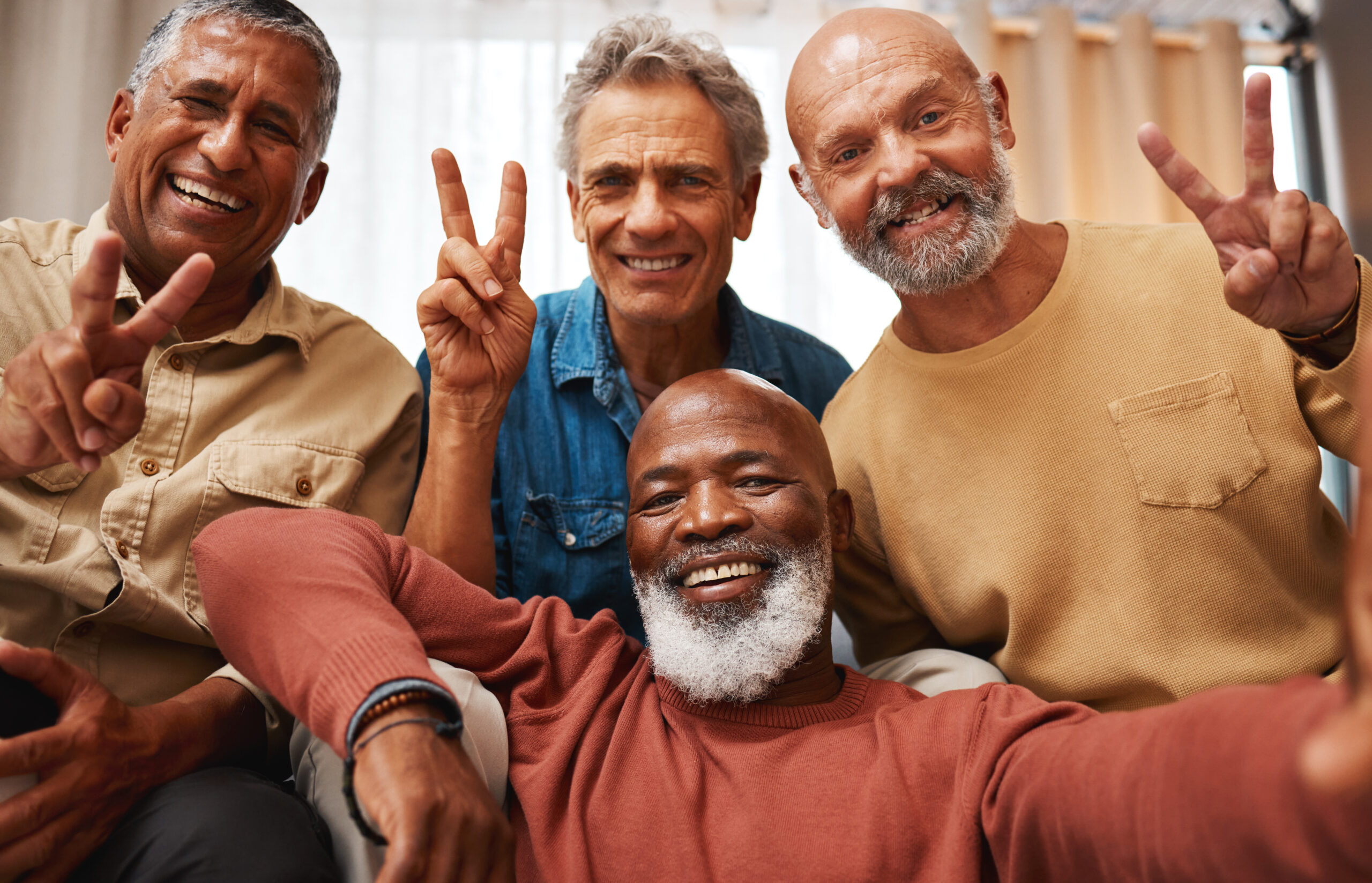 Peace, happy and portrait of men with a selfie, bonding and memory during retirement. Party, smile and elderly friends with a hand sign for happiness, quality time and photo at home together